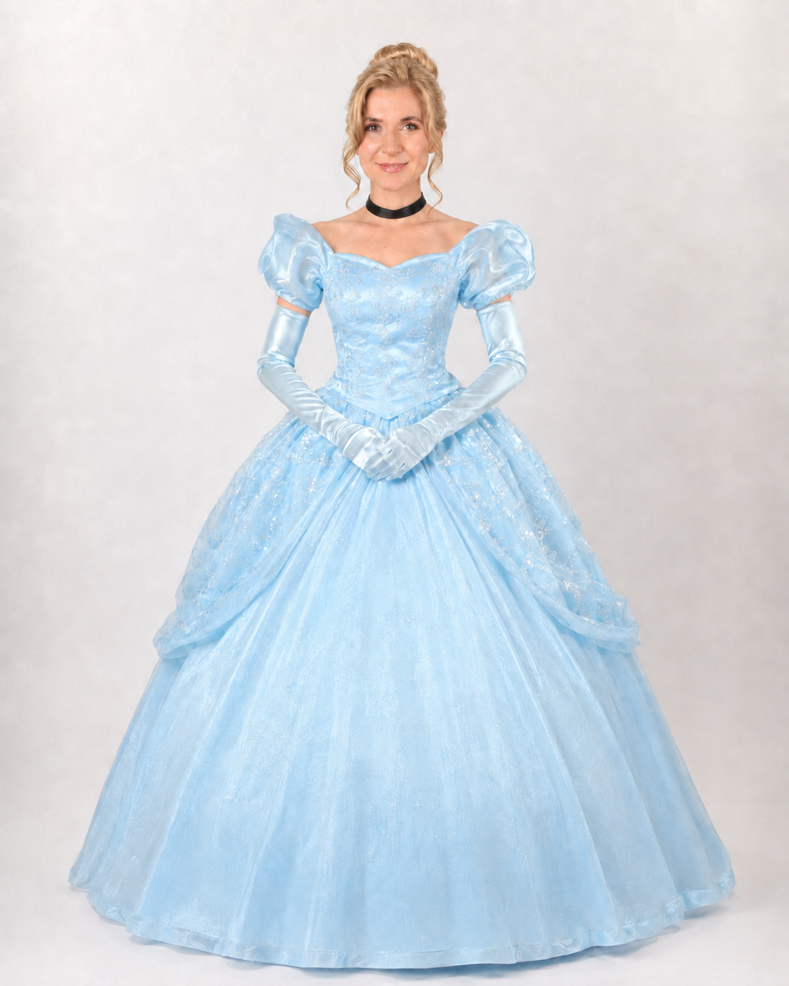 Blonde storybook princess character in a pale blue gown