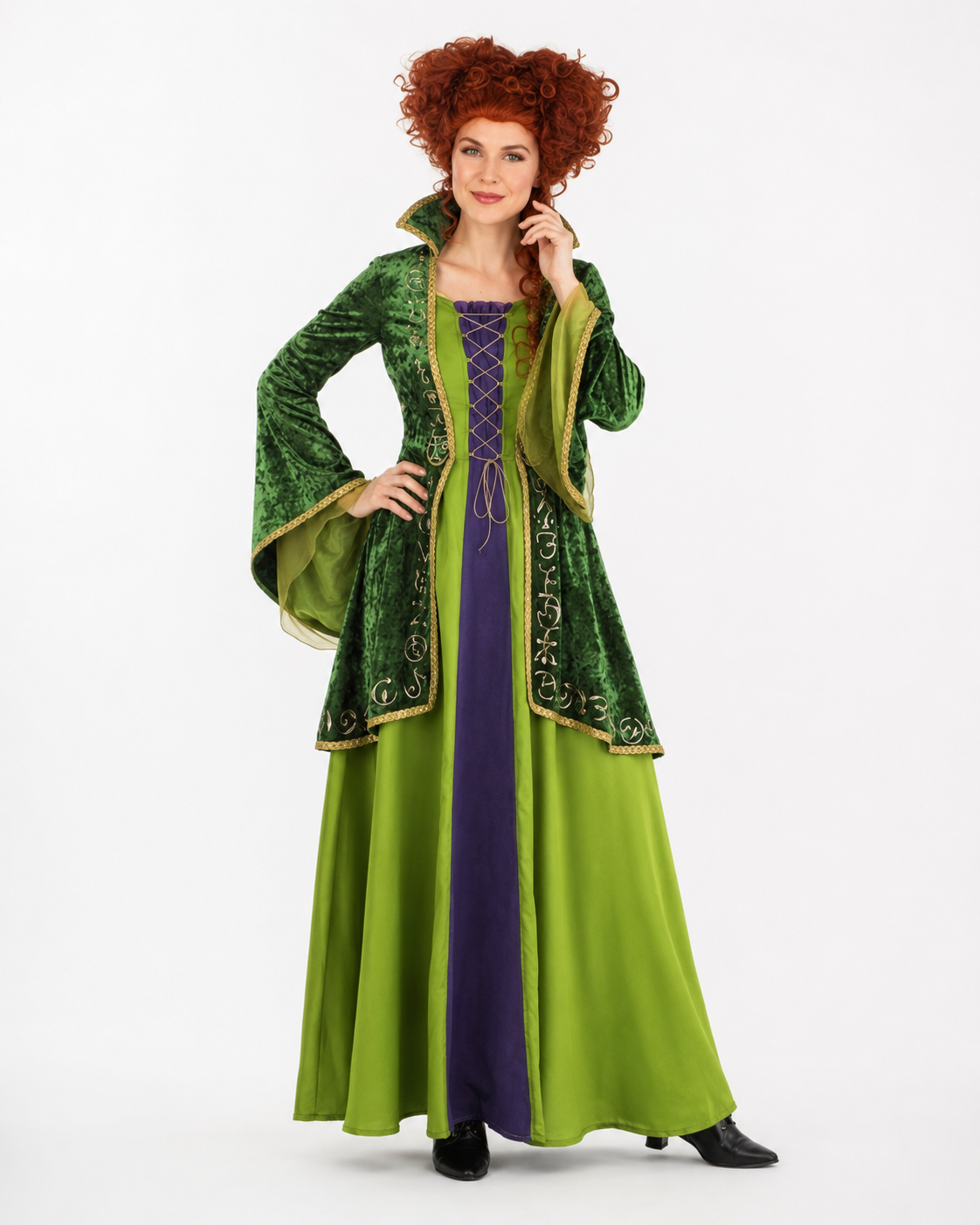 Green storybook witch character in a green dress and coat